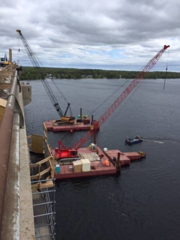 Dual crane on barges for containment