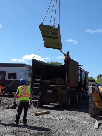 Removal of dismantled girders from project site