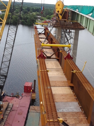 Girder in mid-lift