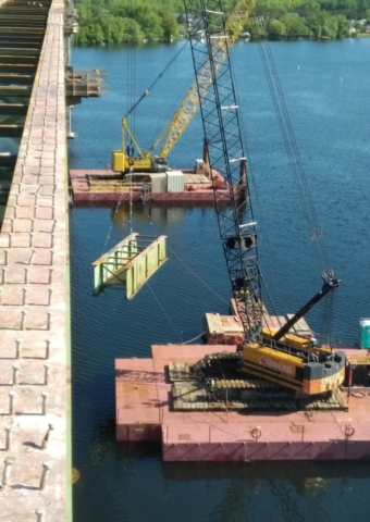 Girder being lowered