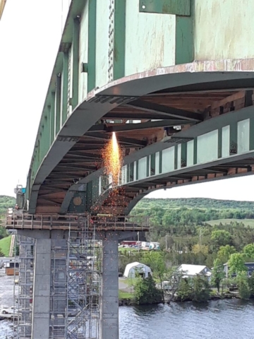 Girder bracing being cut for removal