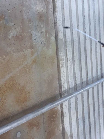 Spraying concrete sealer