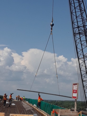 Crane delivering supplies to the deck