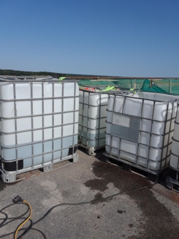 Water holding tanks to keep the fresh concrete wet