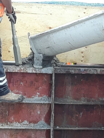 Concrete being placed in the forms