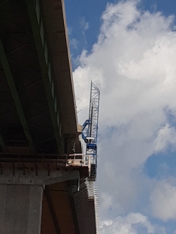 Hydraulic lift used to access the underside of the bridge deck