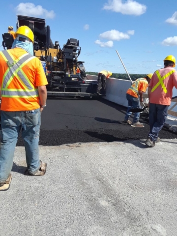 Asphalt placement on the new bridge deck