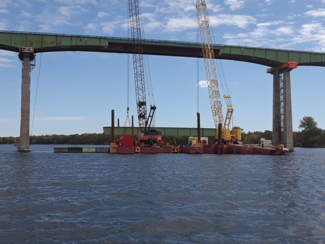 Girder about to lowered onto the barge