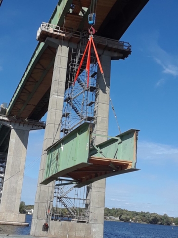 Second piece of girder being lowered