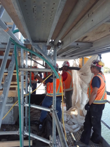 Concrete being pumped into forms on pier 7 - Inside view