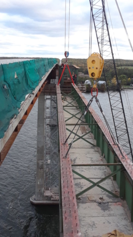 View looking south as the girder is lowered