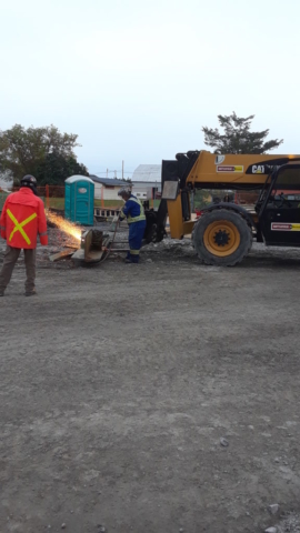 Removed girder pieces being cut for removal from the project site