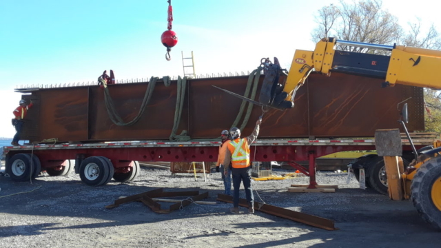 Final section of girder arriving for assembly