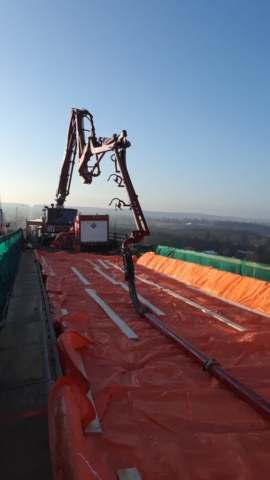 Concrete pump truck in position for deck placement