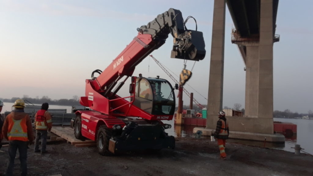 Telescopic handler being removed from the barge