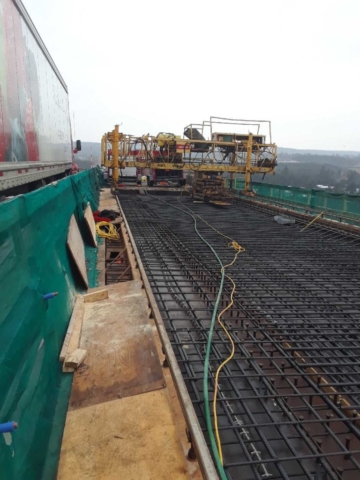 Concrete finisher being assembled on the deck