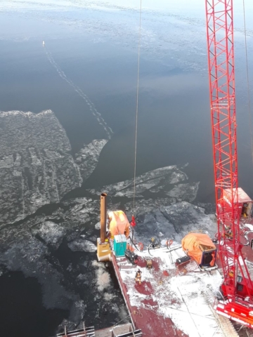 Frost heater being lowered onto the barge