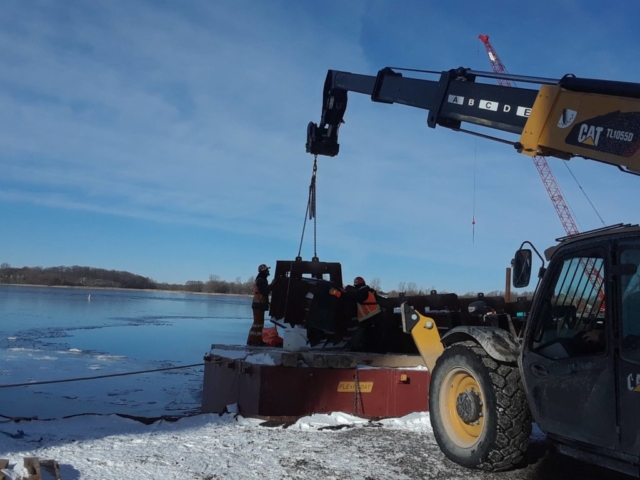 Telehandler loading barrier wall forms