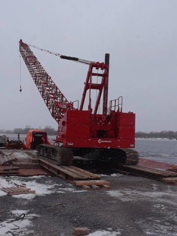 110 ton crane being removed from the barge for the winter