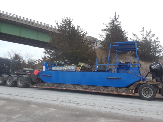 Boat being delivered back to the site for the season