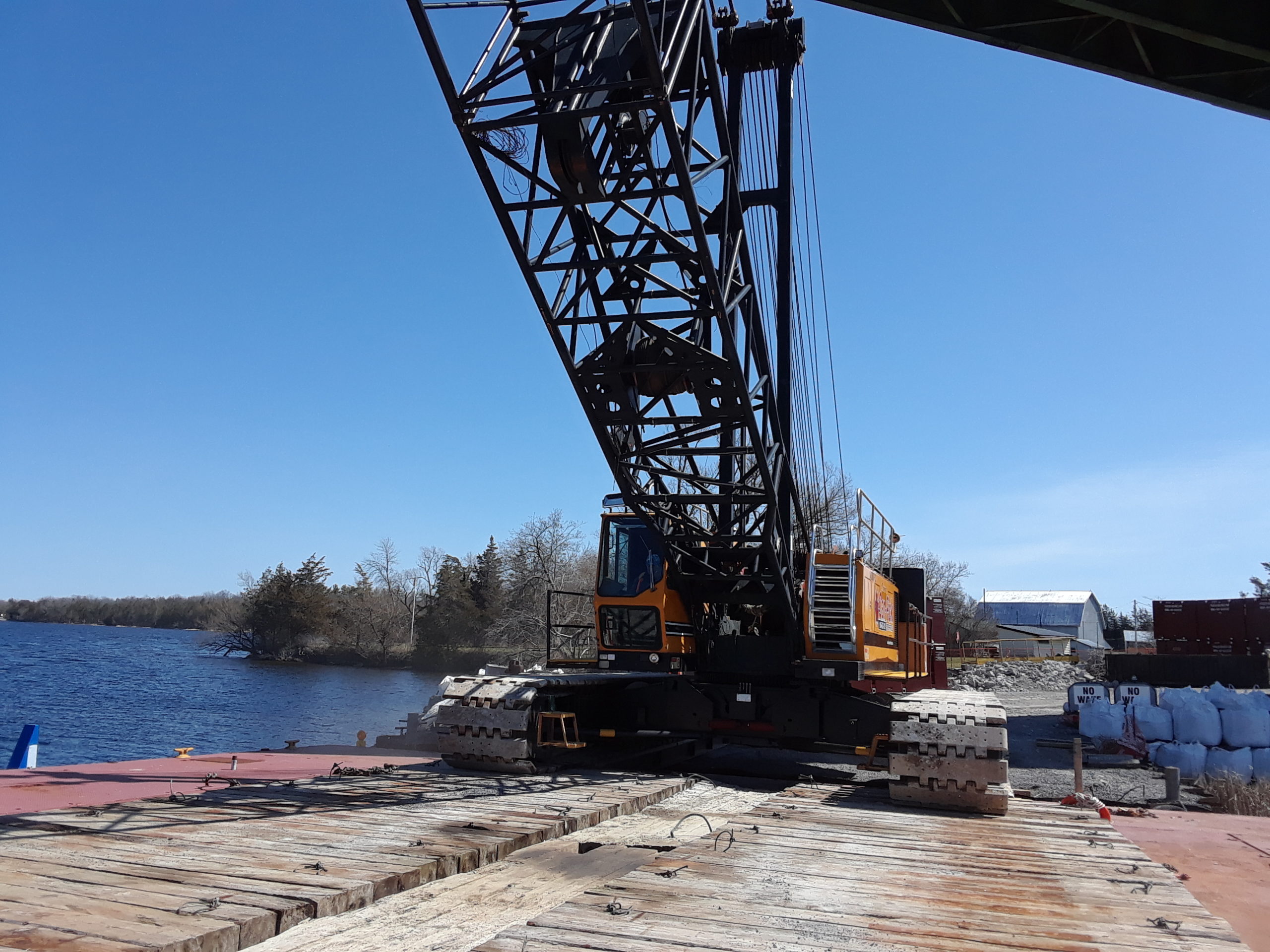 Second 200 ton crane being loaded onto a barge