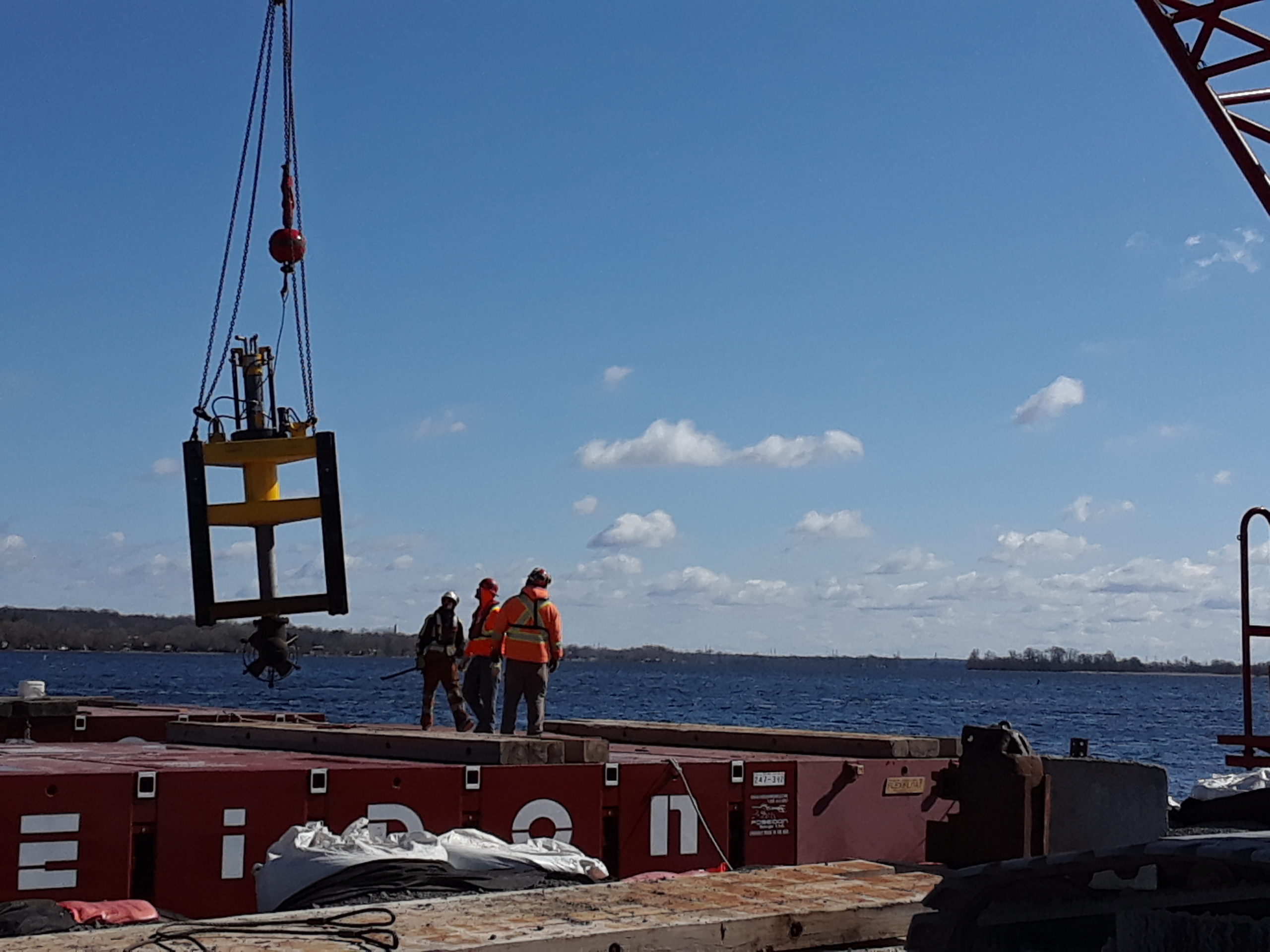 Lowering the propulsion unit for installation on the barge