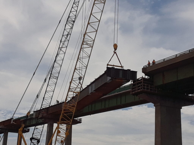 Second approach girder being moved into place