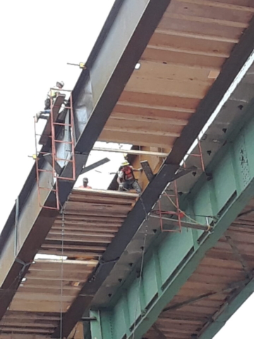 Connecting the two new girders and installing the false decking