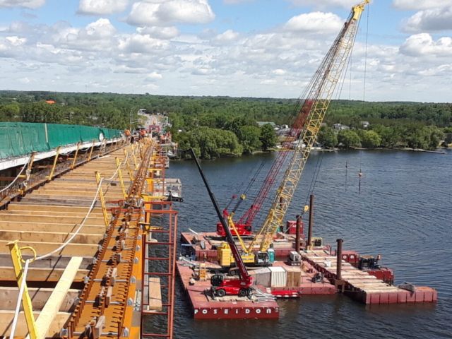 North overview of the new girder section and the barges