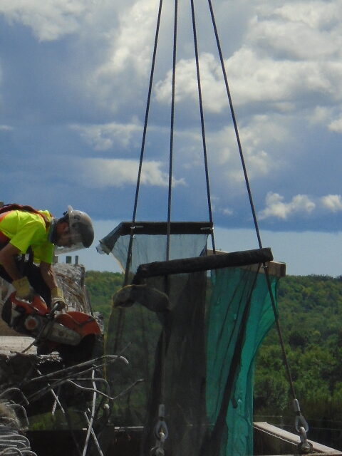 Cutting rebar during barrier wall removal