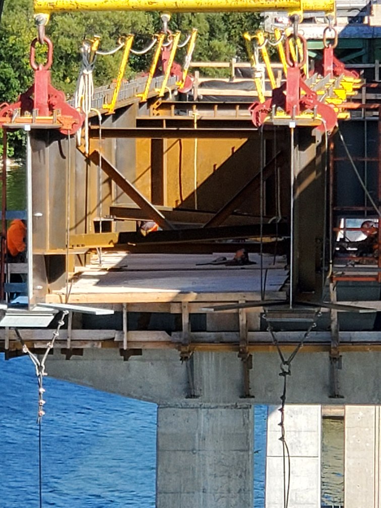 Close-up of the new girder being installed
