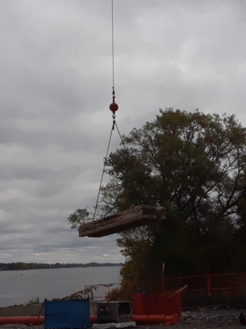 Removing the mats from the barge