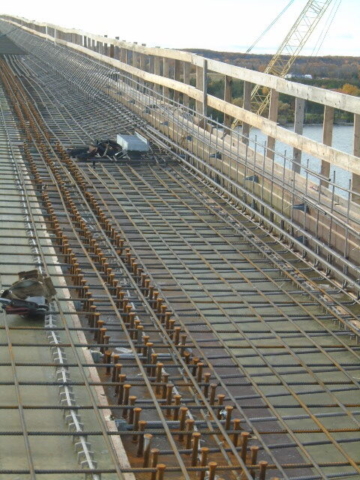 South view of installed rebar on the deck and barrier wall