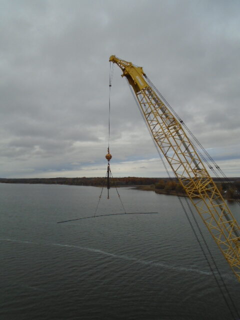 200 ton crane removing excess rebar from the deck