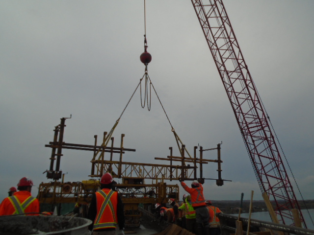 Lowering the work bridge from the barge to the deck