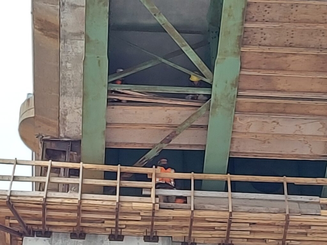 Constructing false decking at pier cap 12