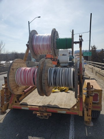 Wire spools being used for the temporary traffic signals