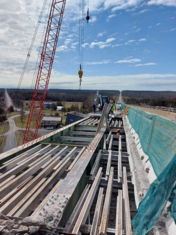 Removed section of concrete deck / containment scaffolding