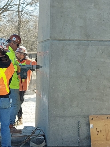 Preparing the piers for future girder removal restraint cables