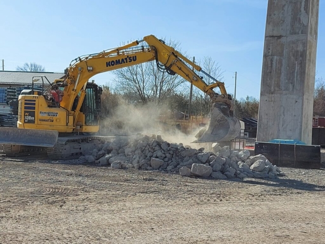 Removing concrete rubble to the removal bins