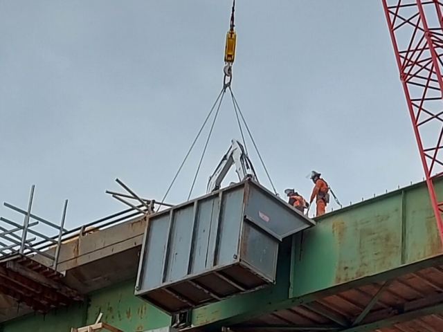 View from below of containment bin and deck removal