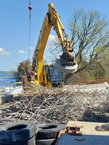 Close up of steel from concrete deck being seperated and removed