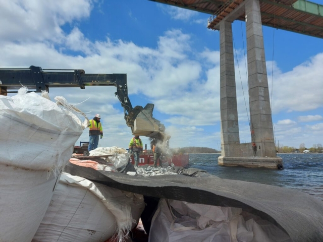 Placing rock for the dock  expansion