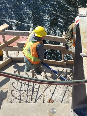 Removing the existing bearing pad on pier 11