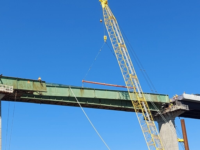 Starting to lower the approach girder section