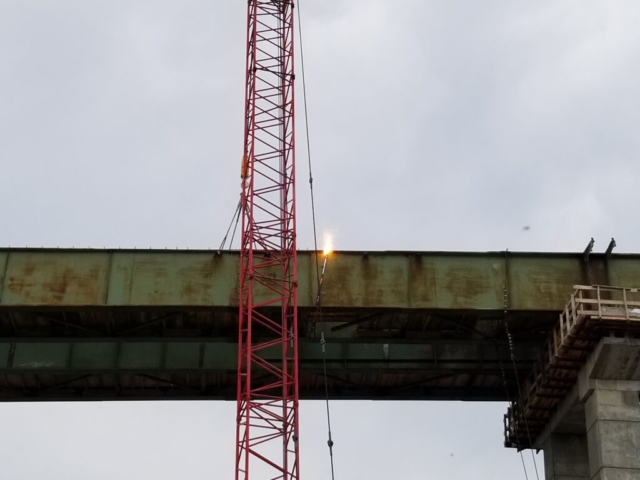 Close-up of the torch cut on the girder