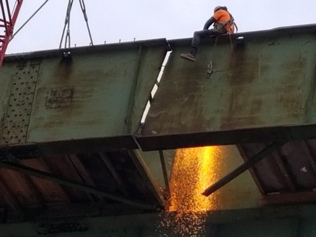 Front of girder cut, inside of girder being cut for removal