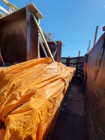 Pier 11, tarping covering the completed concrete placement