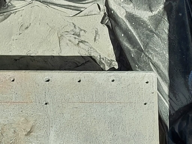 Close-up of drilled dowel holes