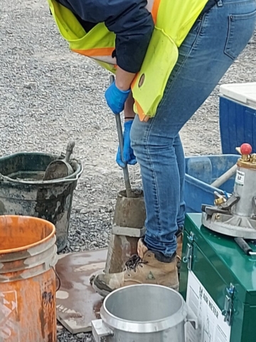 Preparing the slump test before concrete placement